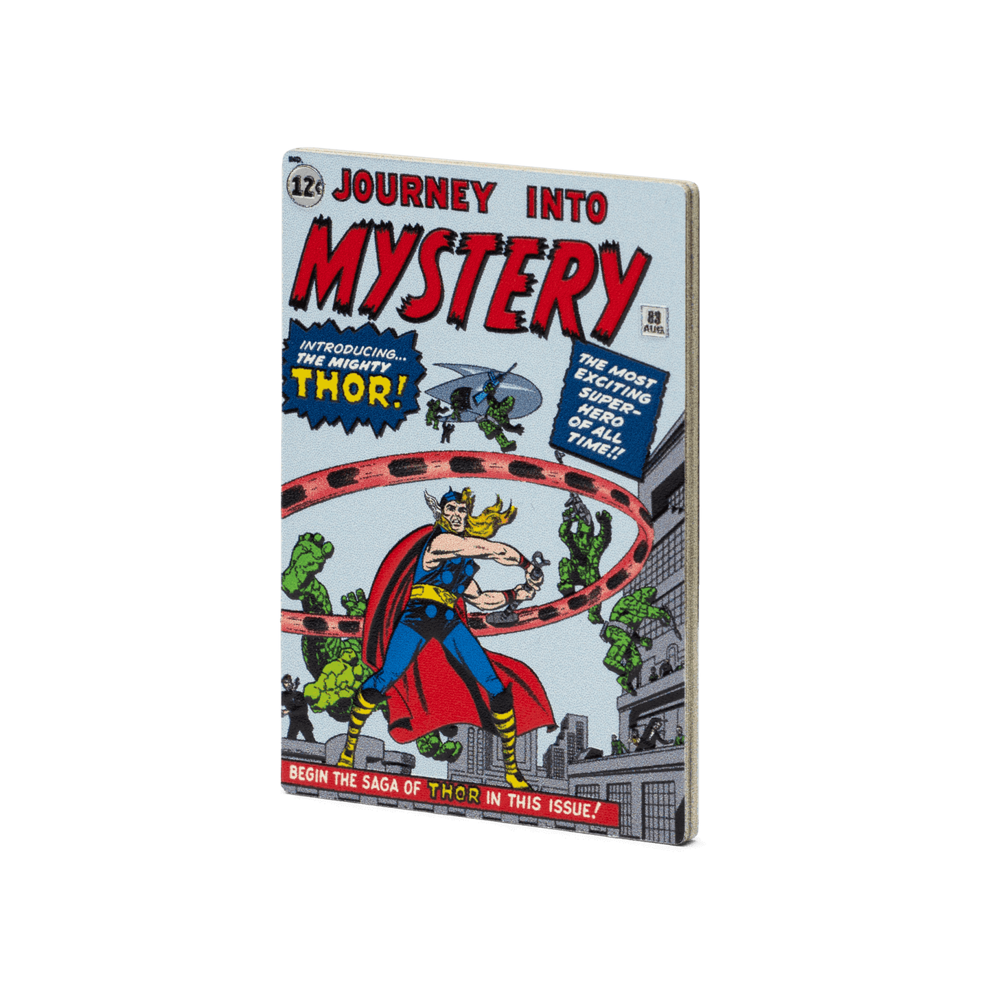 This 1oz pure silver COMIX™ Coin displays a coloured image of the cover of the 1962 comic book, Journey into Mystery #83. To mimic a comic book, it is crafted into a rectangular shape and coloured on all four sides to represent the spine and pages - New Zealand Mint. 