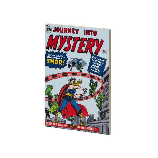 This 1oz pure silver COMIX™ Coin displays a coloured image of the cover of the 1962 comic book, Journey into Mystery #83. To mimic a comic book, it is crafted into a rectangular shape and coloured on all four sides to represent the spine and pages - New Zealand Mint. 