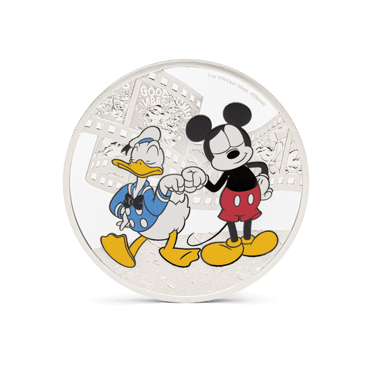 Add some bromance with this adorable 3oz pure silver coin for Disney’s Mickey Mouse and Donald Duck! Shows the two beloved best friends in colour, wearing their classic get-up and sharing a fist bump, which stands out against the mirrored background. - New Zealand Mint