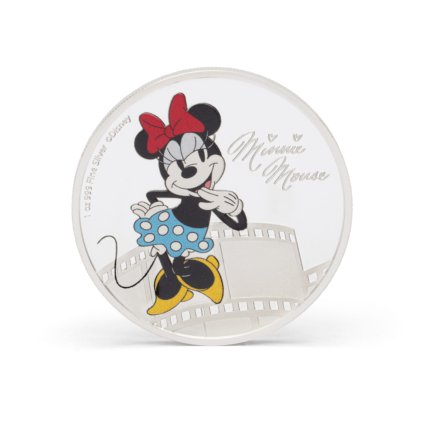 This 1oz pure silver coin features a mirror-finish background with Disney’s Minnie Mouse in colour, next to her engraved signature. She is shown striking a cute pose and wearing her classic bow, white gloves and polka dot skirt.