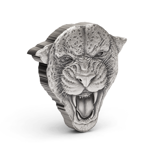 The elusive feline, the Leopard, features on this exquisite 2oz pure silver coin. Features the head of a leopard with its terrifying gaze and growl. The leopard’s facial features and spotted fur are depicted with a beautiful antique finish. - New Zealand Mint