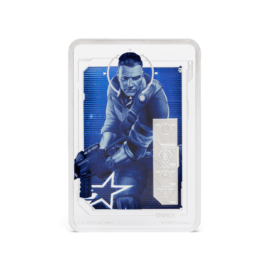 G.I. Joe fans rejoice! Rectangular coin highlights a detailed and vibrantly coloured image of Duke in action. A mirrored border frames Duke and his name is engraved below. Icons symbolising his stats are frosted for additional effect. - New Zealand Mint