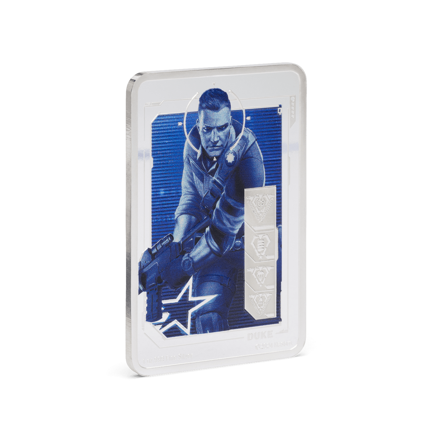 G.I. Joe fans rejoice! Rectangular coin highlights a detailed and vibrantly coloured image of Duke in action. A mirrored border frames Duke and his name is engraved below. Icons symbolising his stats are frosted for additional effect. - New Zealand Mint