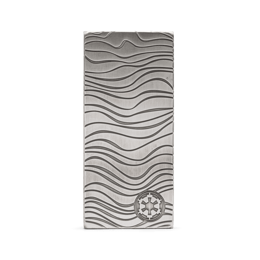 In The Mandalorian™, Djarin is paid for his mission in bars of Beskar™ steel. Back for 2022, this collectible 10oz pure silver bar is a replica version, incorporating the same wavey ridges and patterns and stamped with the Imperial shield. - New Zealand Mint