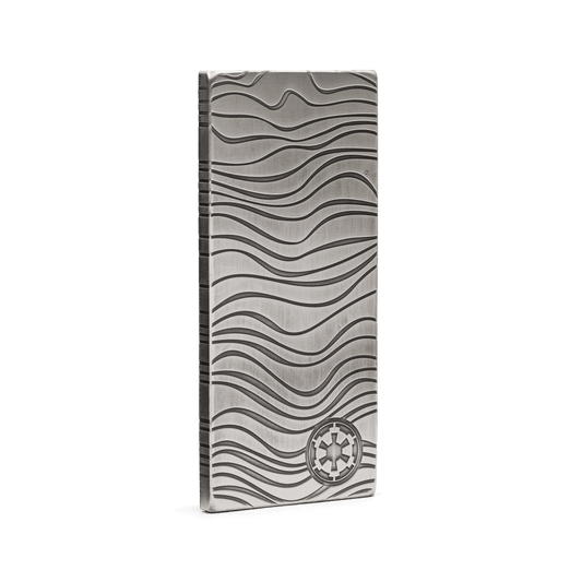 In The Mandalorian™, Djarin is paid for his mission in bars of Beskar™ steel. Back for 2022, this collectible 10oz pure silver bar is a replica version, incorporating the same wavey ridges and patterns and stamped with the Imperial shield. - New Zealand Mint