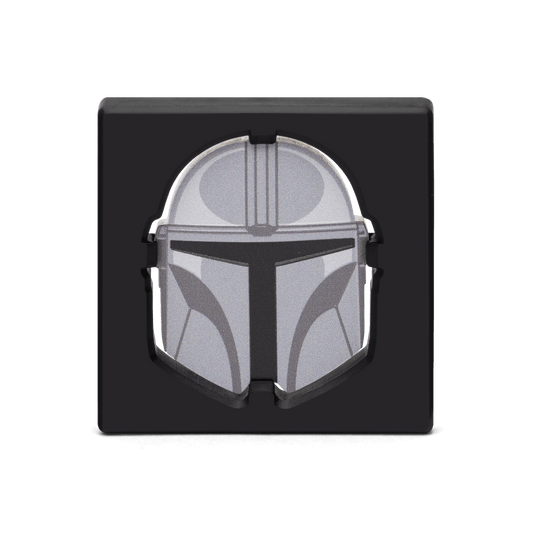 Honour the legacy of the sacred Mandalorian helmet with this enigmatic 1oz pure silver coin. Features the indomitable bounty hunter Din Djarin’s iconic helmet, as seen in the live-action series, along with engravings to capture the helmet's contours. - New Zealand Mint