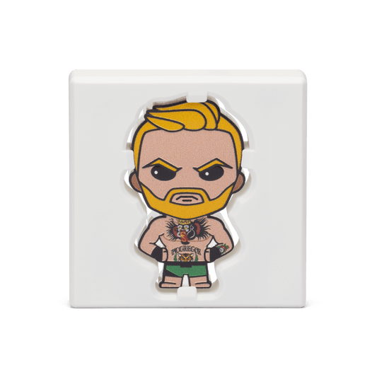 The Notorious looks ready to enter the Octagon for another victory knockout on this Chibi® Coin! Coloured and shaped Chibi® Coin features a stylised version of “The Notorious” Conor McGregor and his iconic tattoos. - New Zealand Mint